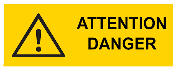 Panneau jaune « Attention danger »